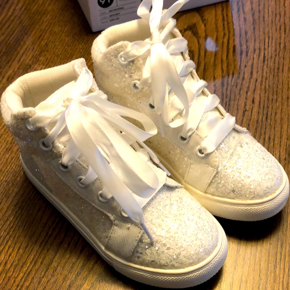 Glitter white girls shoes from David’s bridal
